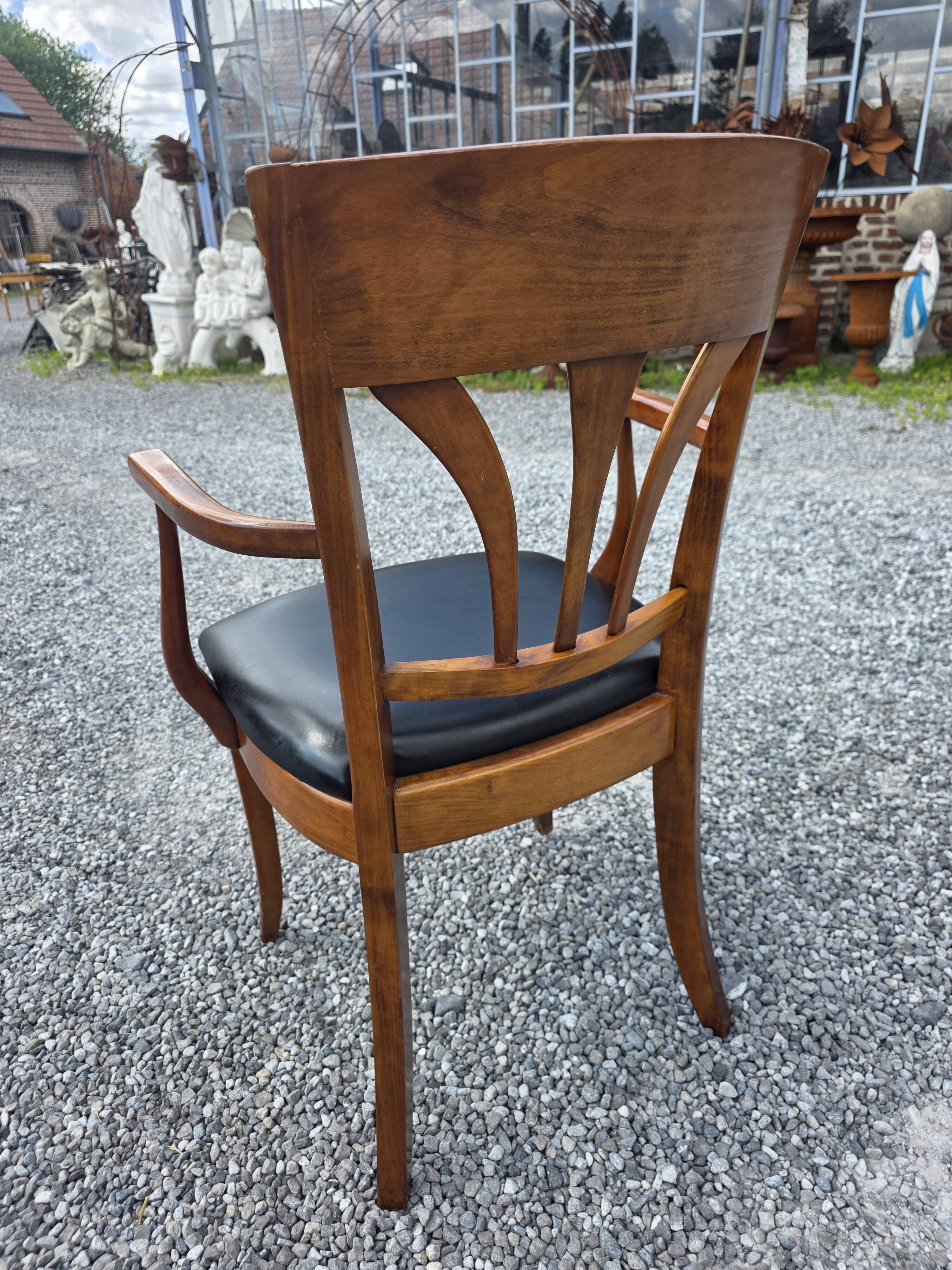Mid-20th century solid cherry wood office chair.