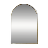 Brass wall mirror in the shape of a handmade holder