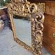 Miroir en bois dore a coquille