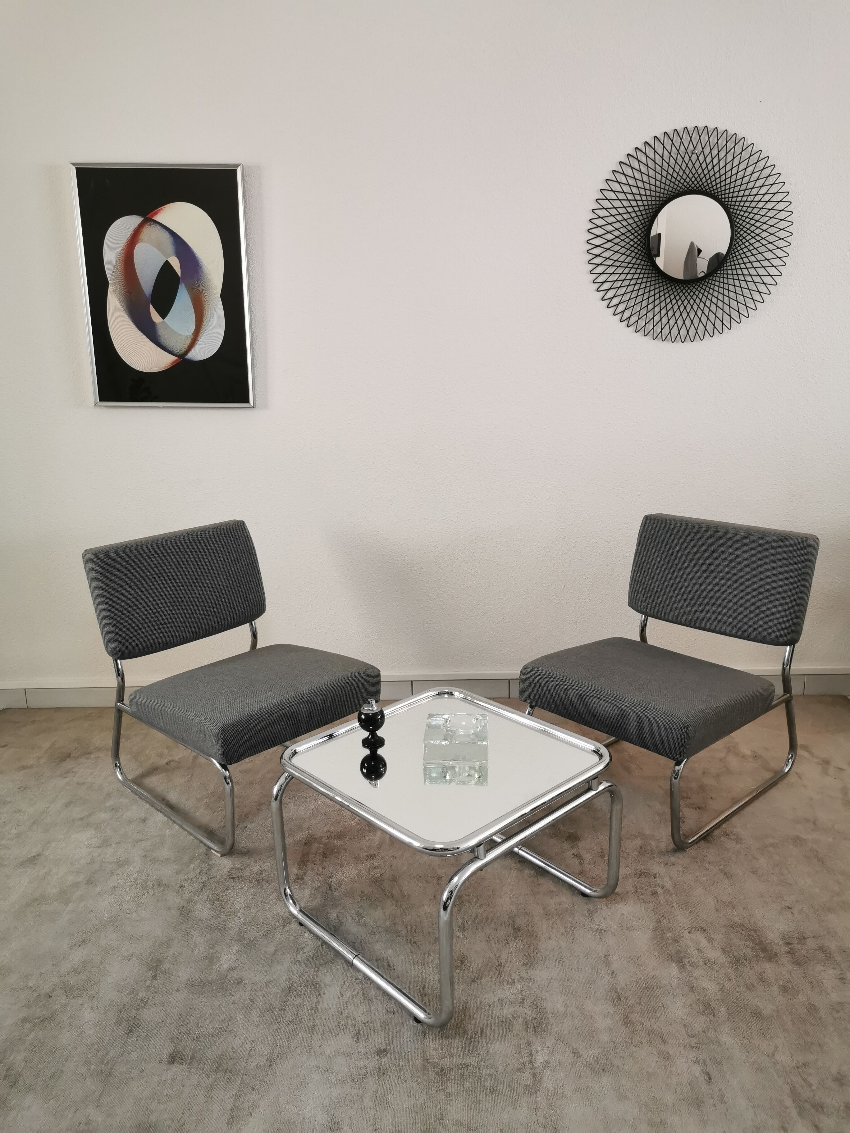 Pair of vintage chrome armchairs and "chicken foot" fabrics