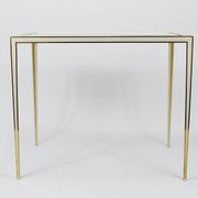 A pair of brass and white mirror tables from Vereinigte Werkstätten, Germany, 1970s.