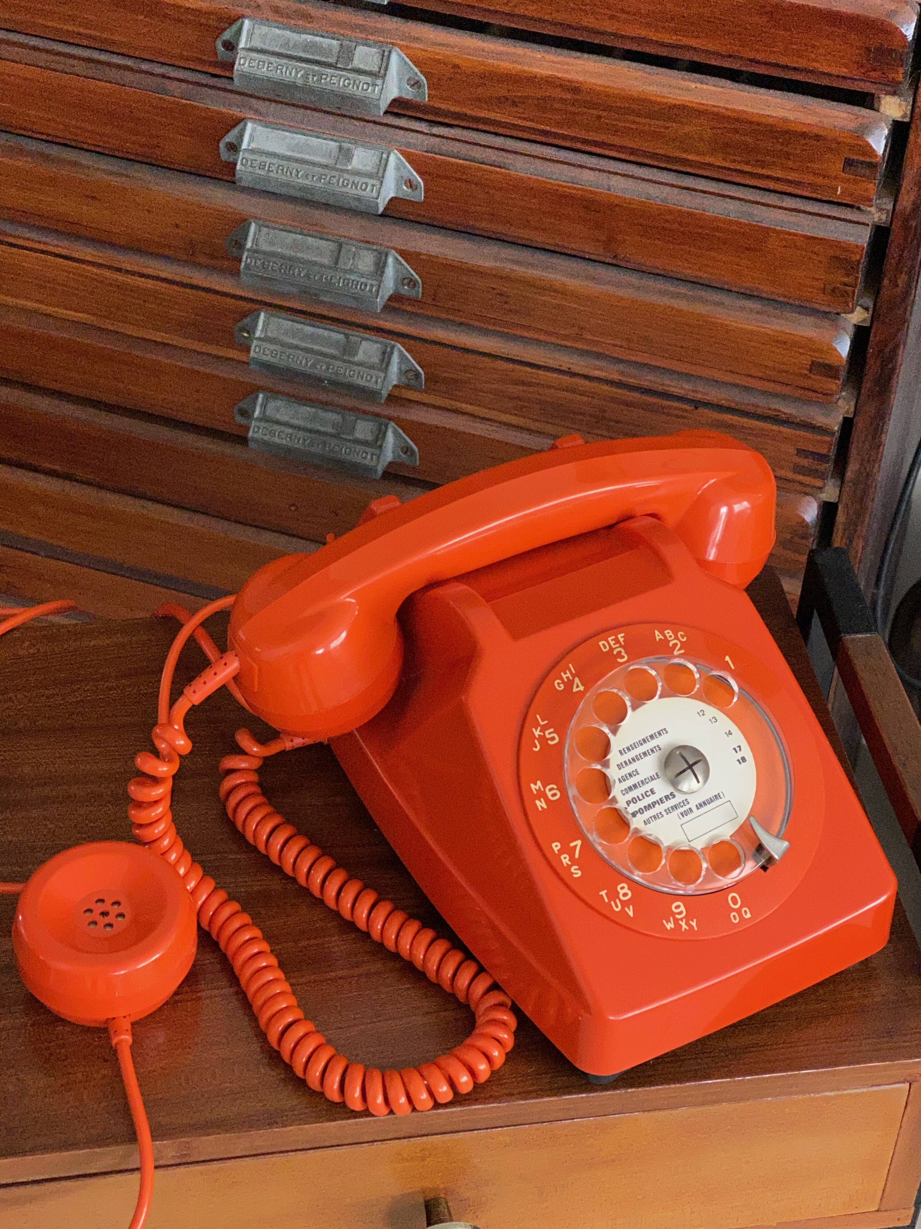 Vintage orange dial phone