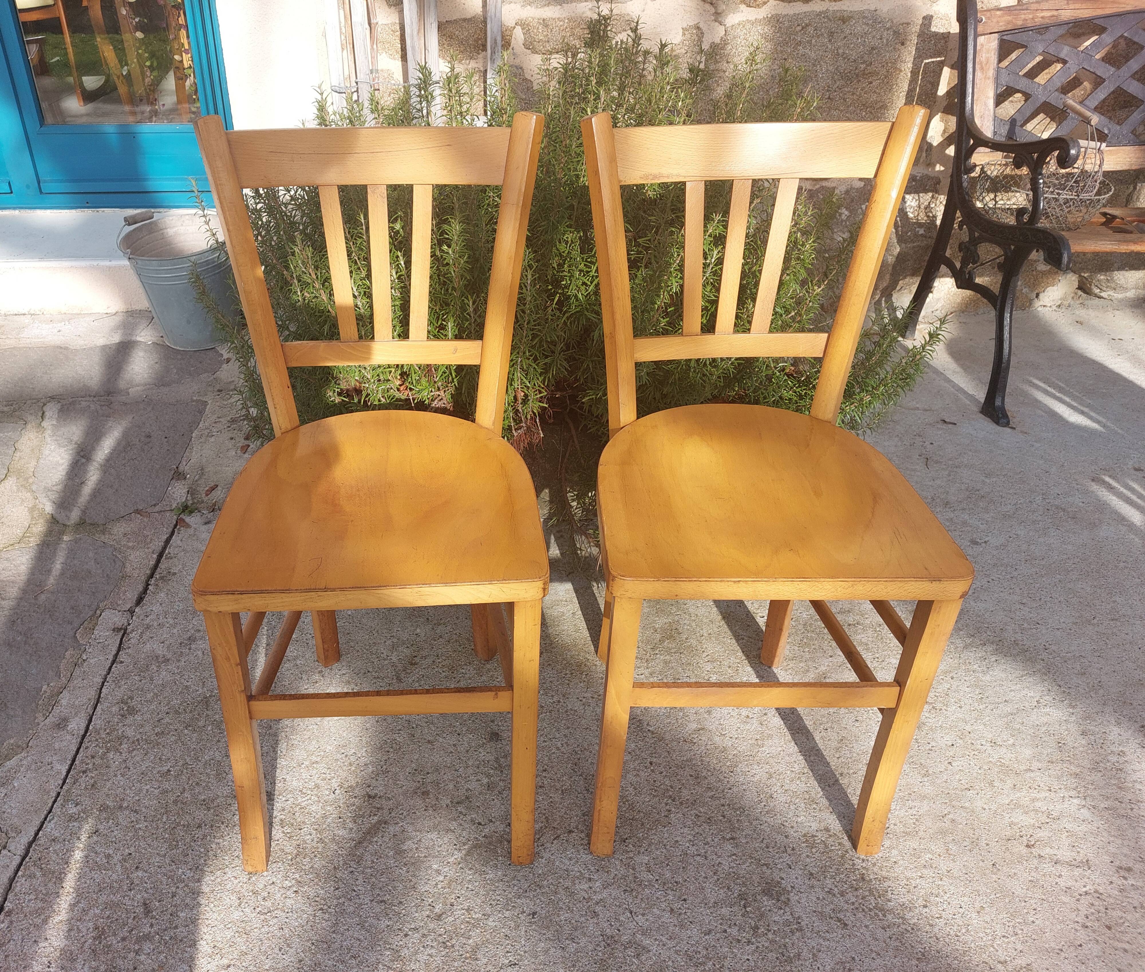pair of Luterma style bistro chairs