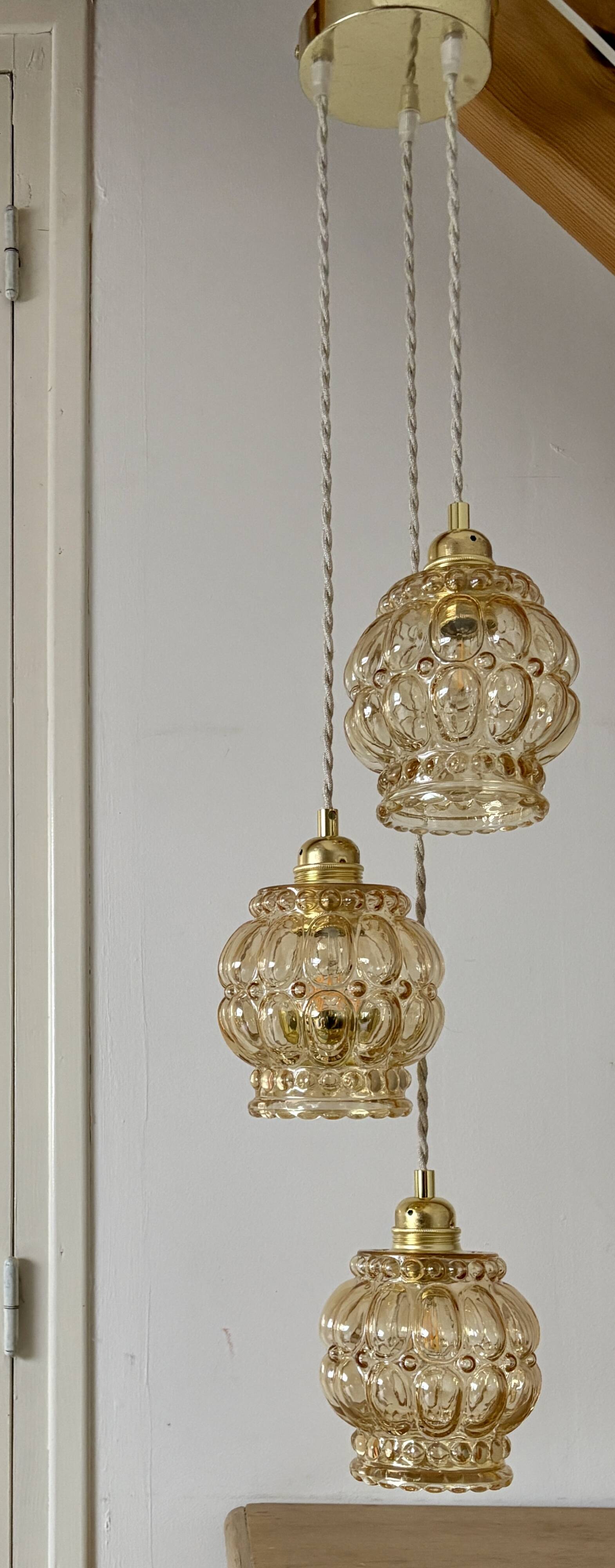 Suspension triple globes vintage en verre ambré bulle