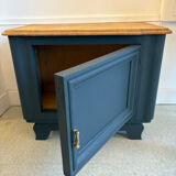 Mat black storage furniture, natural top.