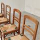 Set of 4 designer oak and straw chairs from the 1950s
