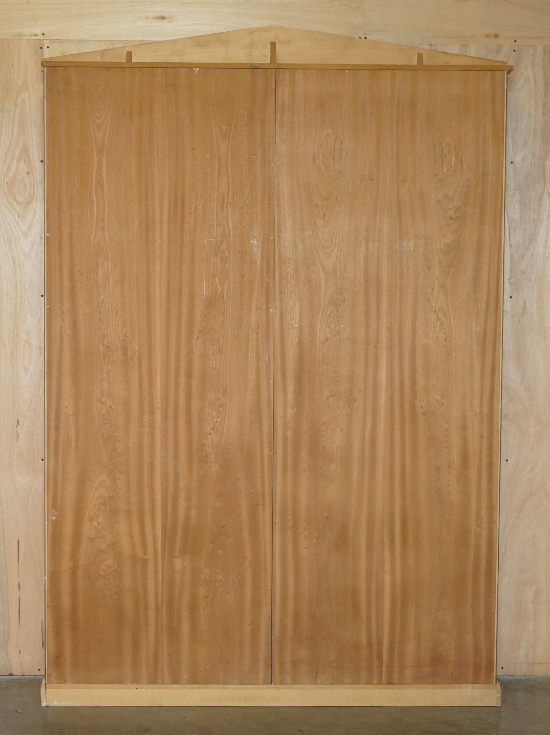 Pair of large open bookshelves in satin birch and walnut, height 2.5 m.