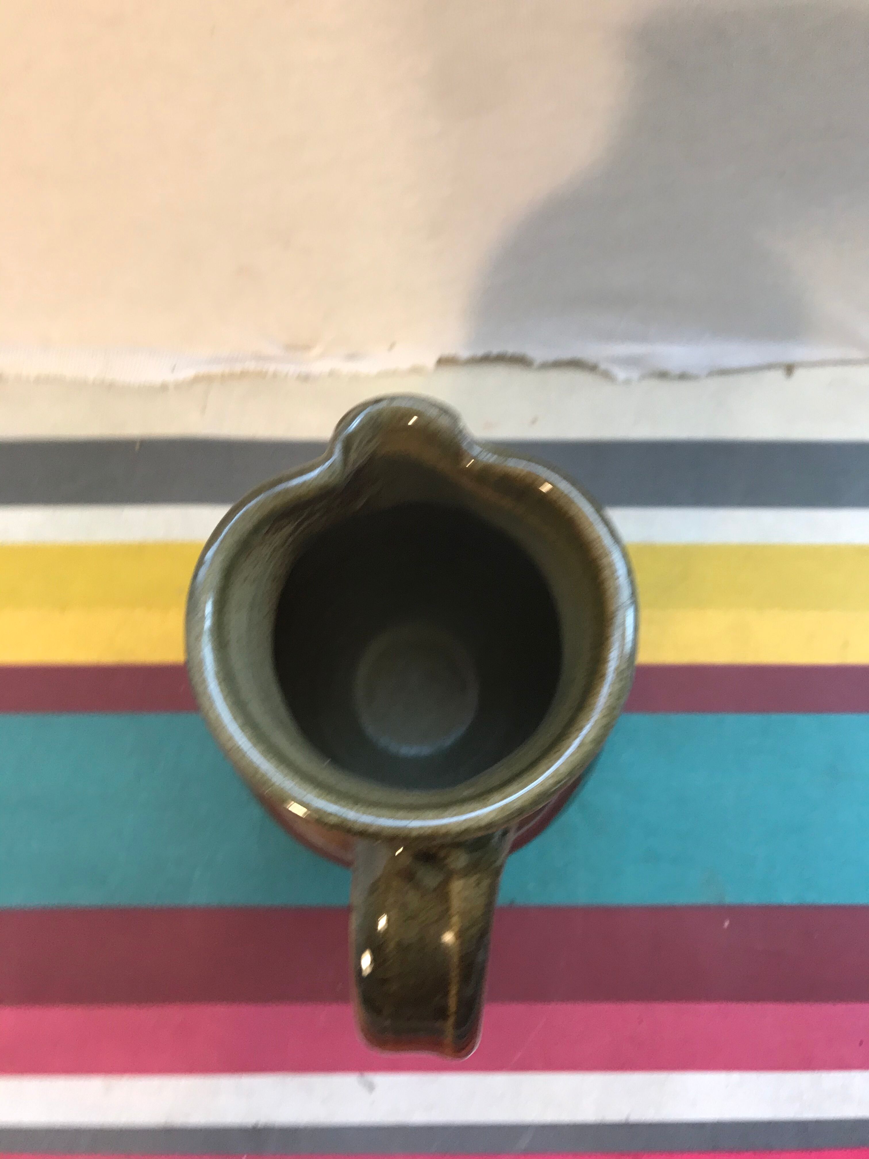 Former green enamelled sandstone pitcher