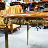 Round table / pedestal table in marble and gilded metal