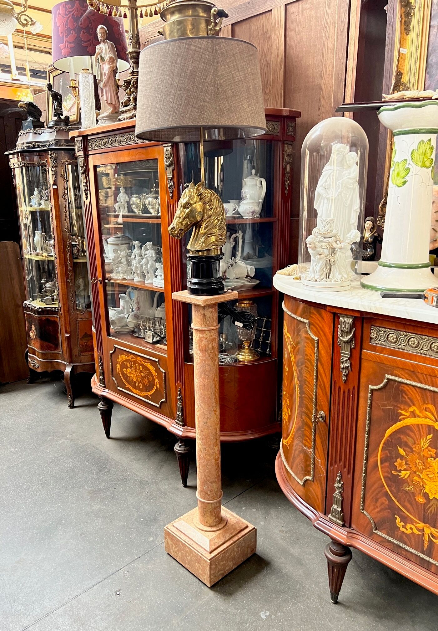 Table lamp made of solid bronze on a marble base.