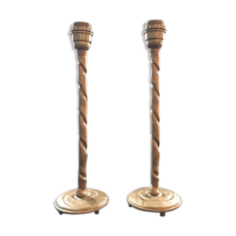 Pair of feet of golden lamps