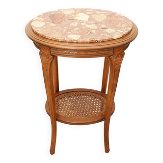 Oval pedestal table, pink marble top, carved cherry and canework