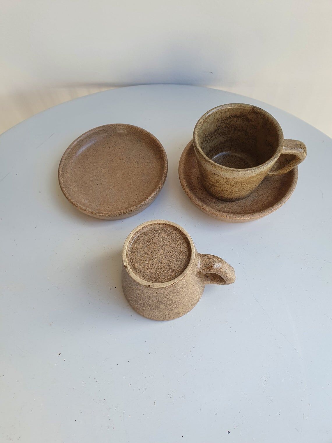 Lot of 2 cups and saucers in sandstone