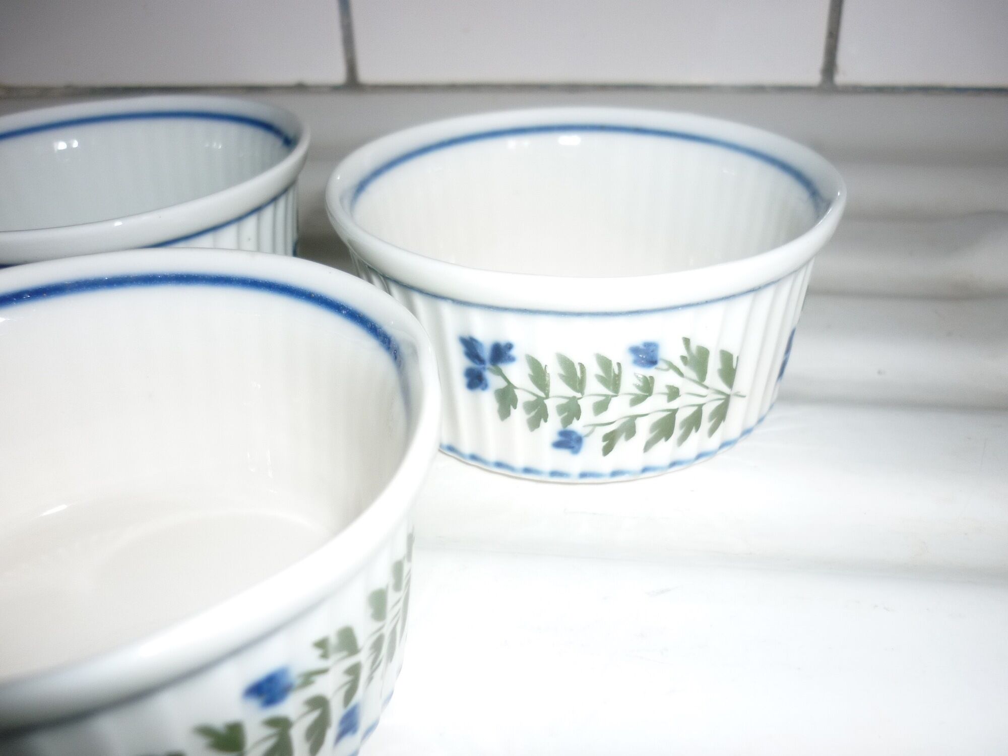 5 porcelain ramekins with smoother decoration and blue flowers and foliage