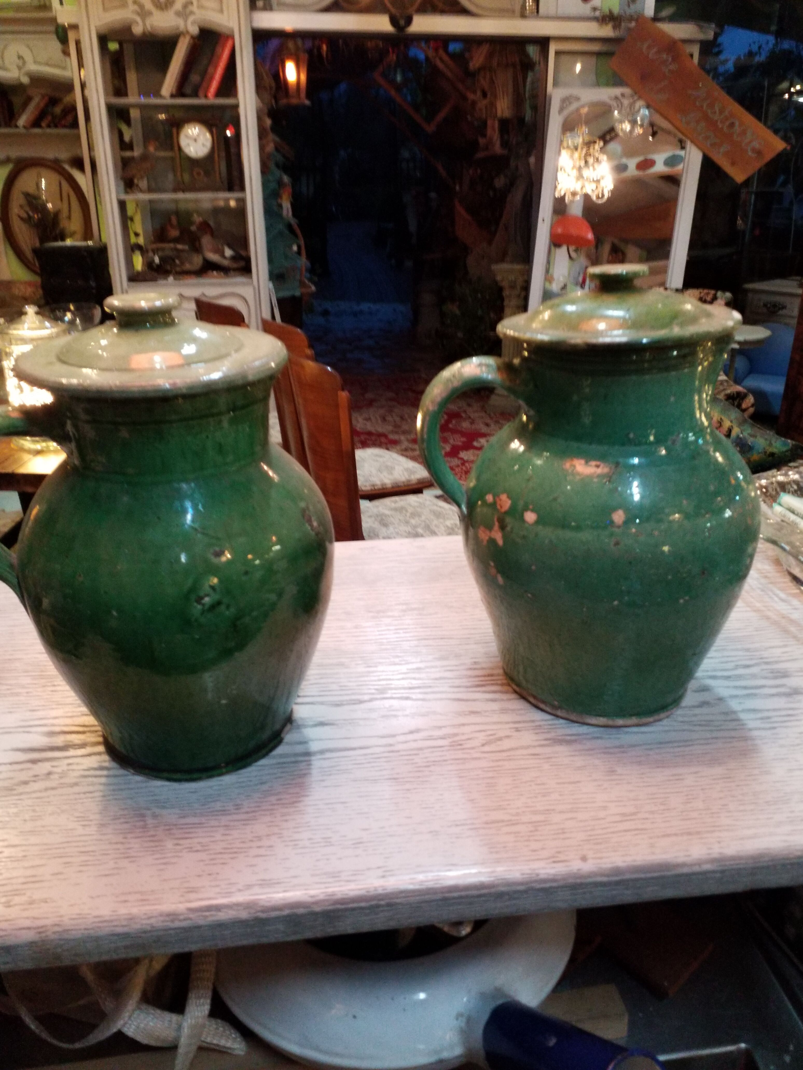 Pairs of jugs in varnished earth