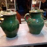 Pairs of jugs in varnished earth