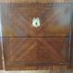 Wooden and marble chest of drawers