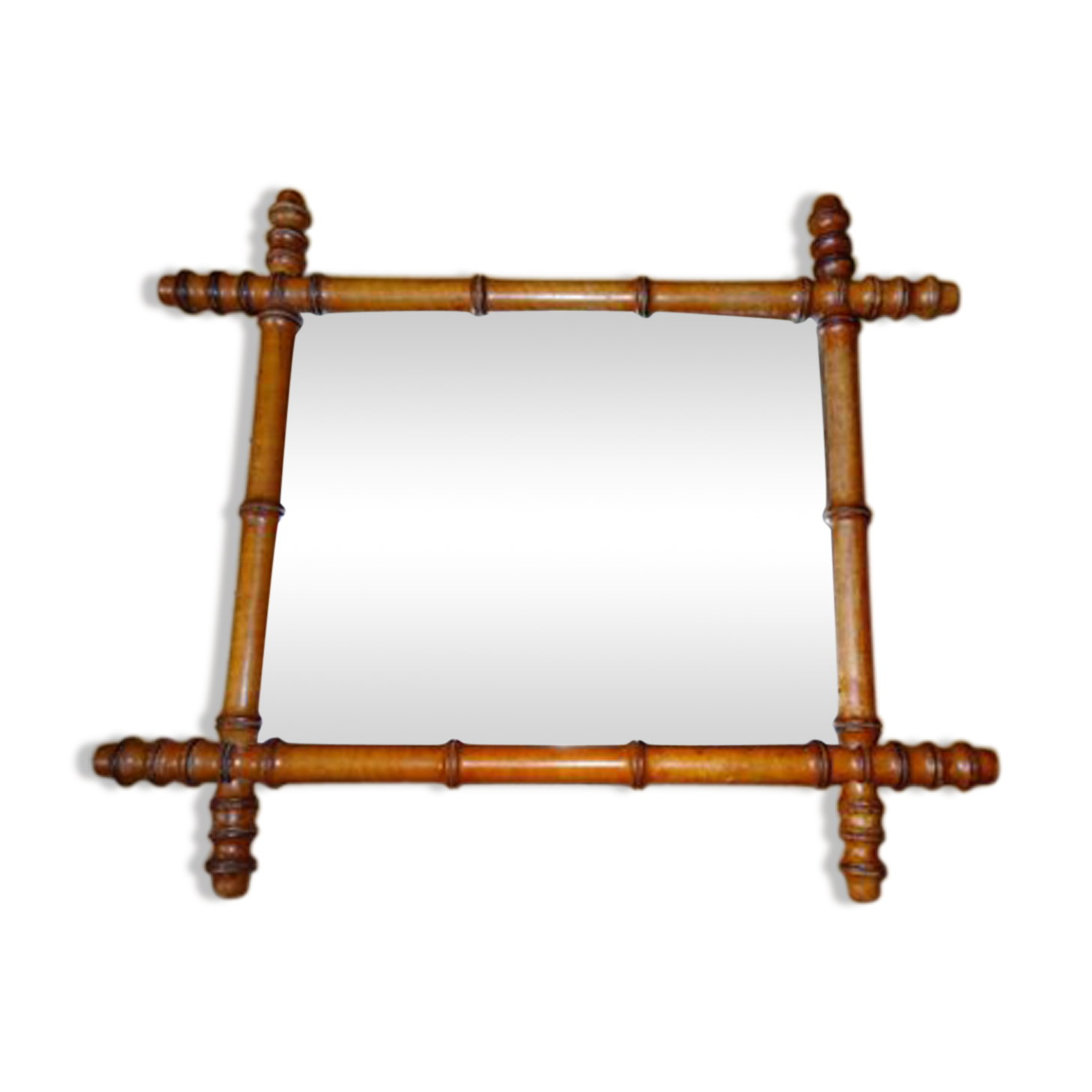 Mirror to the wooden frame imitating bamboo