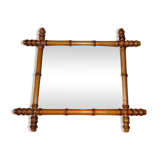 Mirror to the wooden frame imitating bamboo