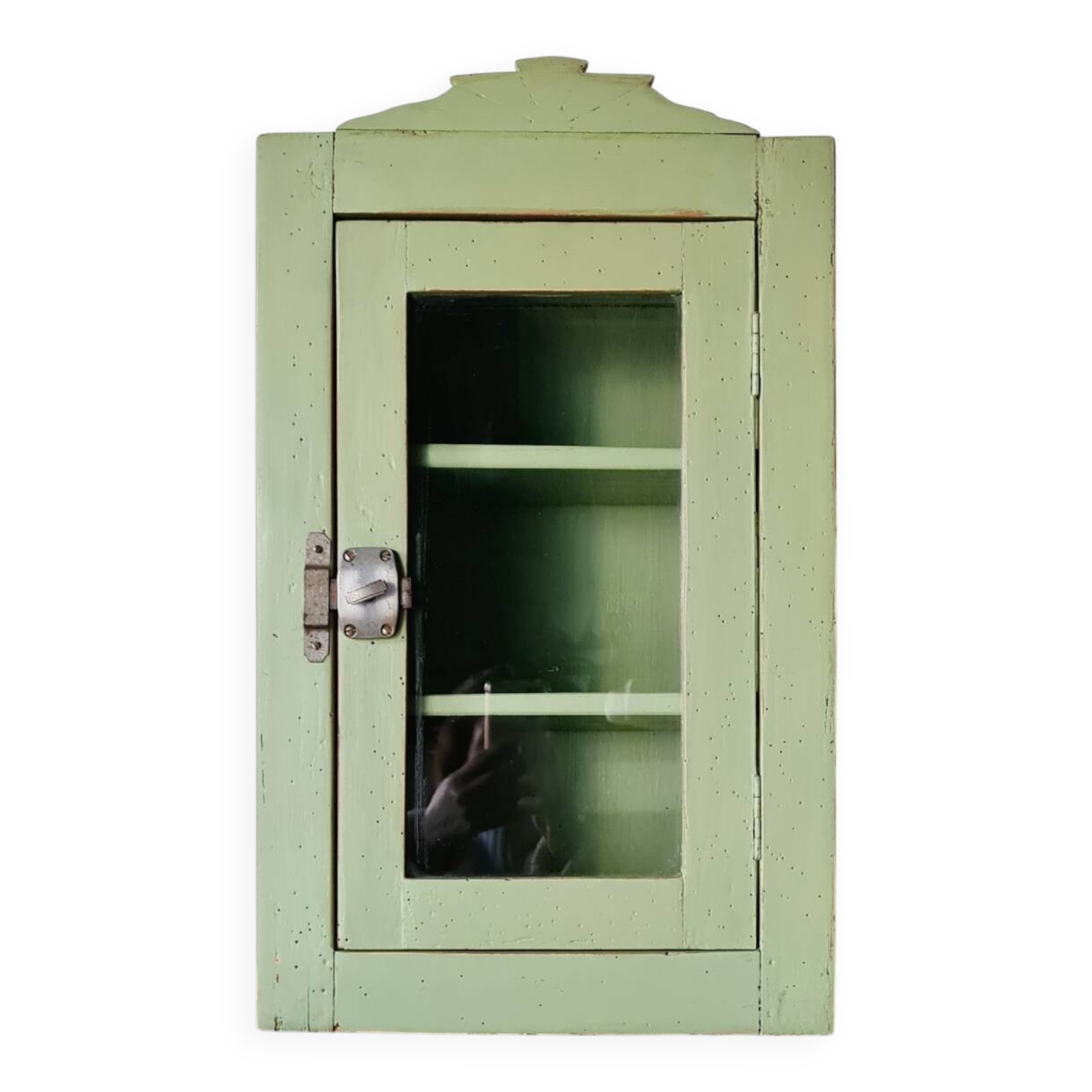 Small glass cabinet in green colour.