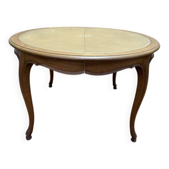 Round oak dining table with leather in Louis XV style.