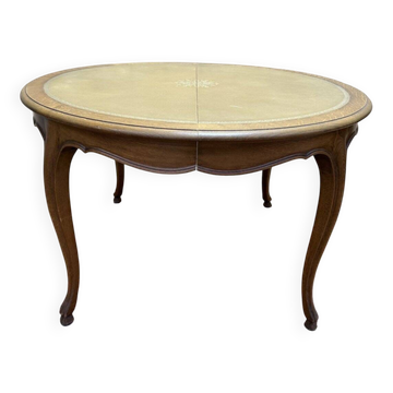 Round oak dining table with leather in Louis XV style.