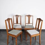 Set of 4 Art Deco chairs in carved wood.