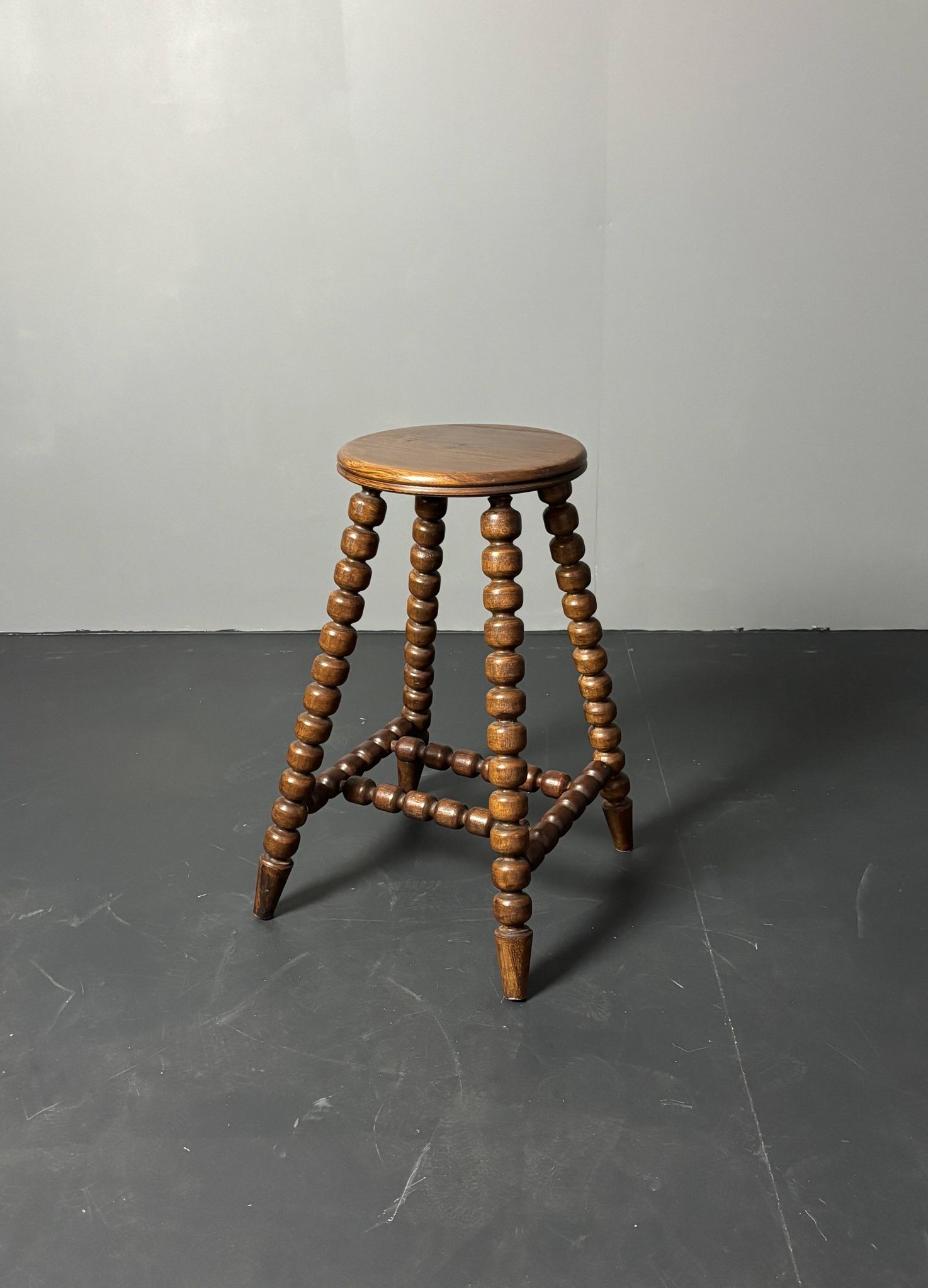 Midcentury brutalist wood turned stool in the style of Charles Dudouyt, 50s