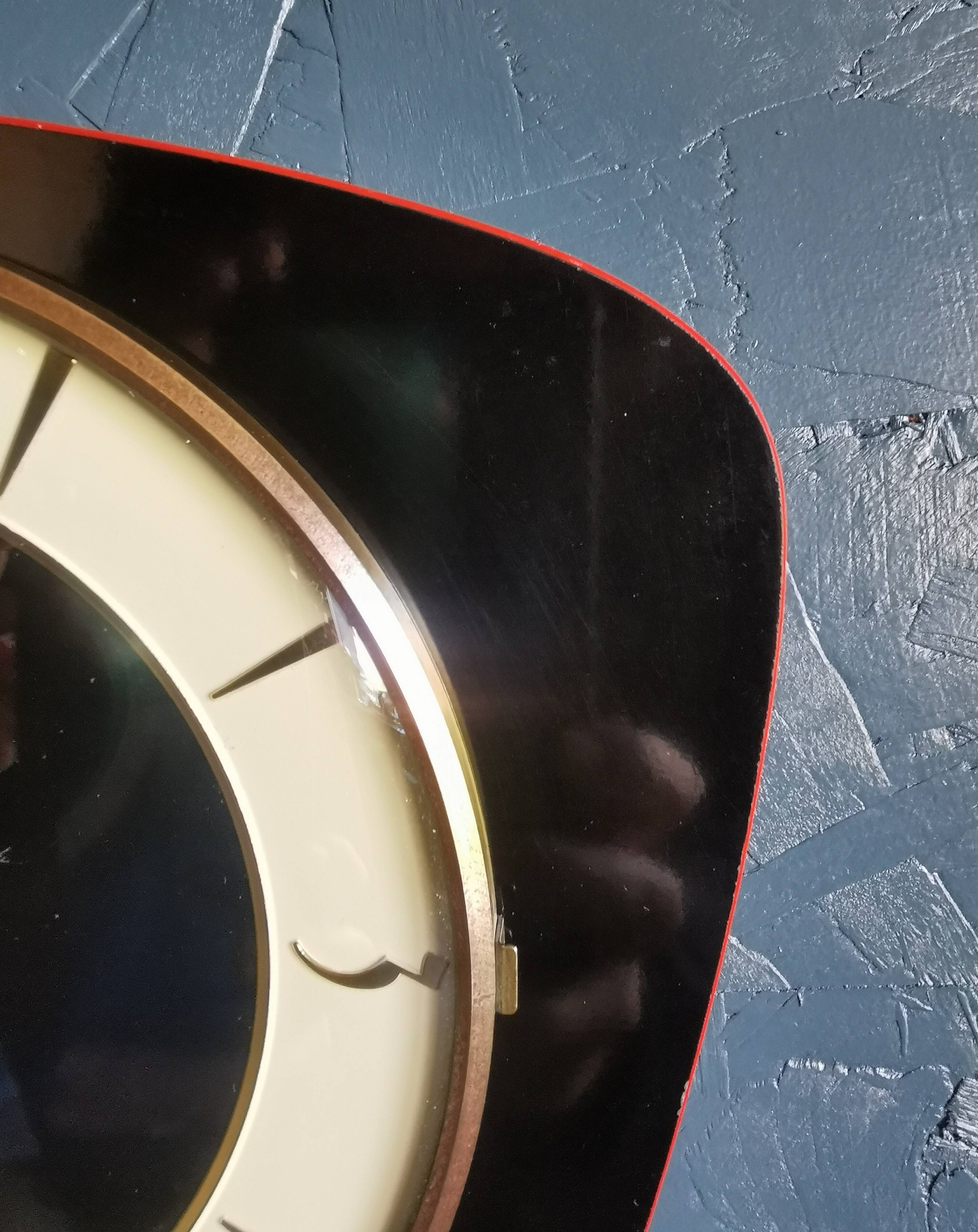 Vintage formica silent trapezoid wall clock "Flash black transistor"