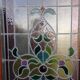 Late 19th century store doors, haberdashery front with Art Nouveau stained glass windows
