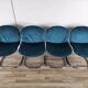 Four 1970s tubular chairs upholstered in blue velvet