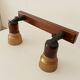 Vintage double spot wall light in wood and brass 80s