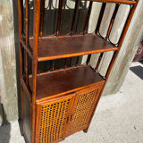Library shelf, vintage rattan storage unit and canning.