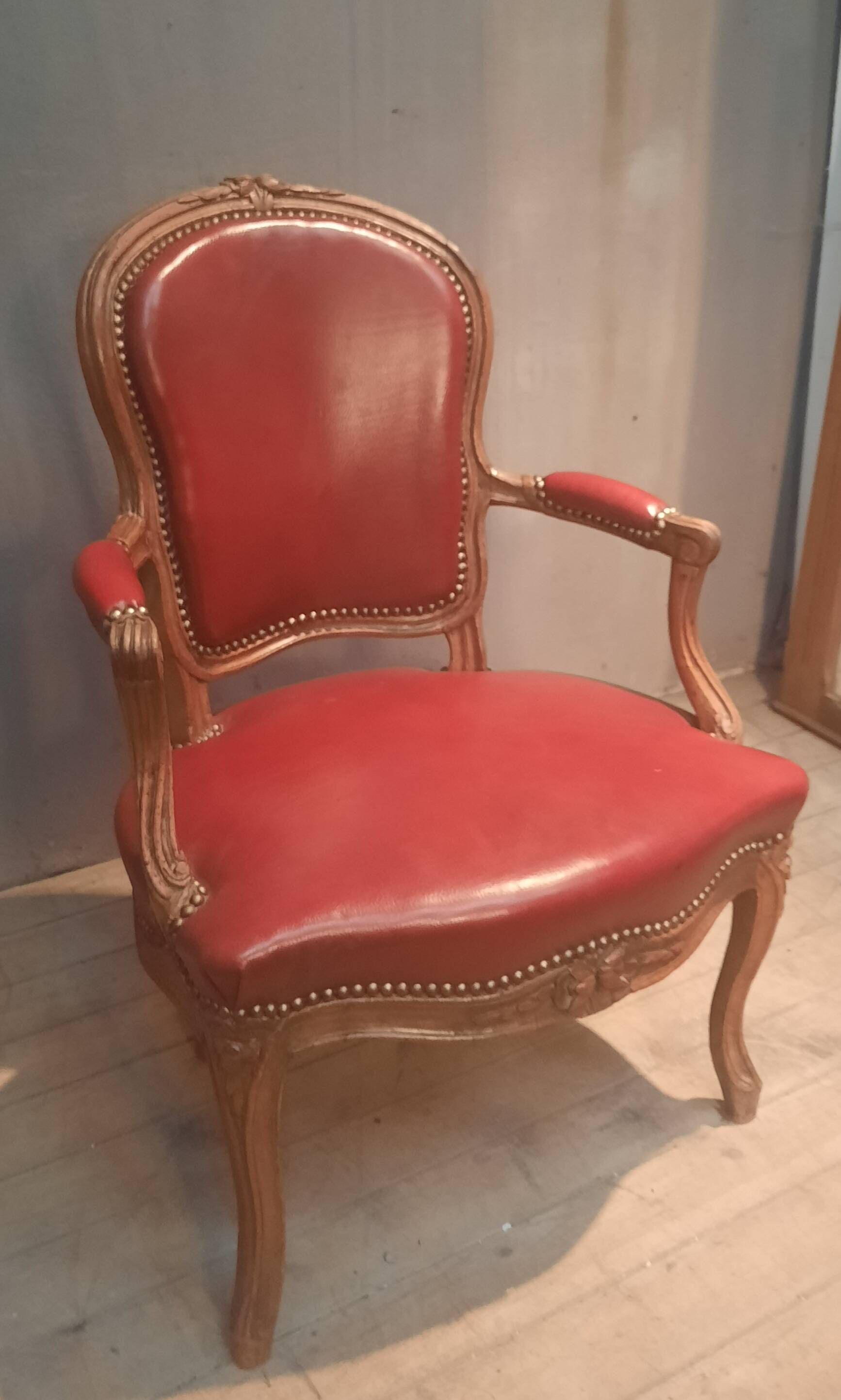 Louis XV period armchair covered in leather.