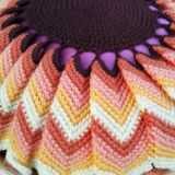 Rattan pouf and its 70's cushion