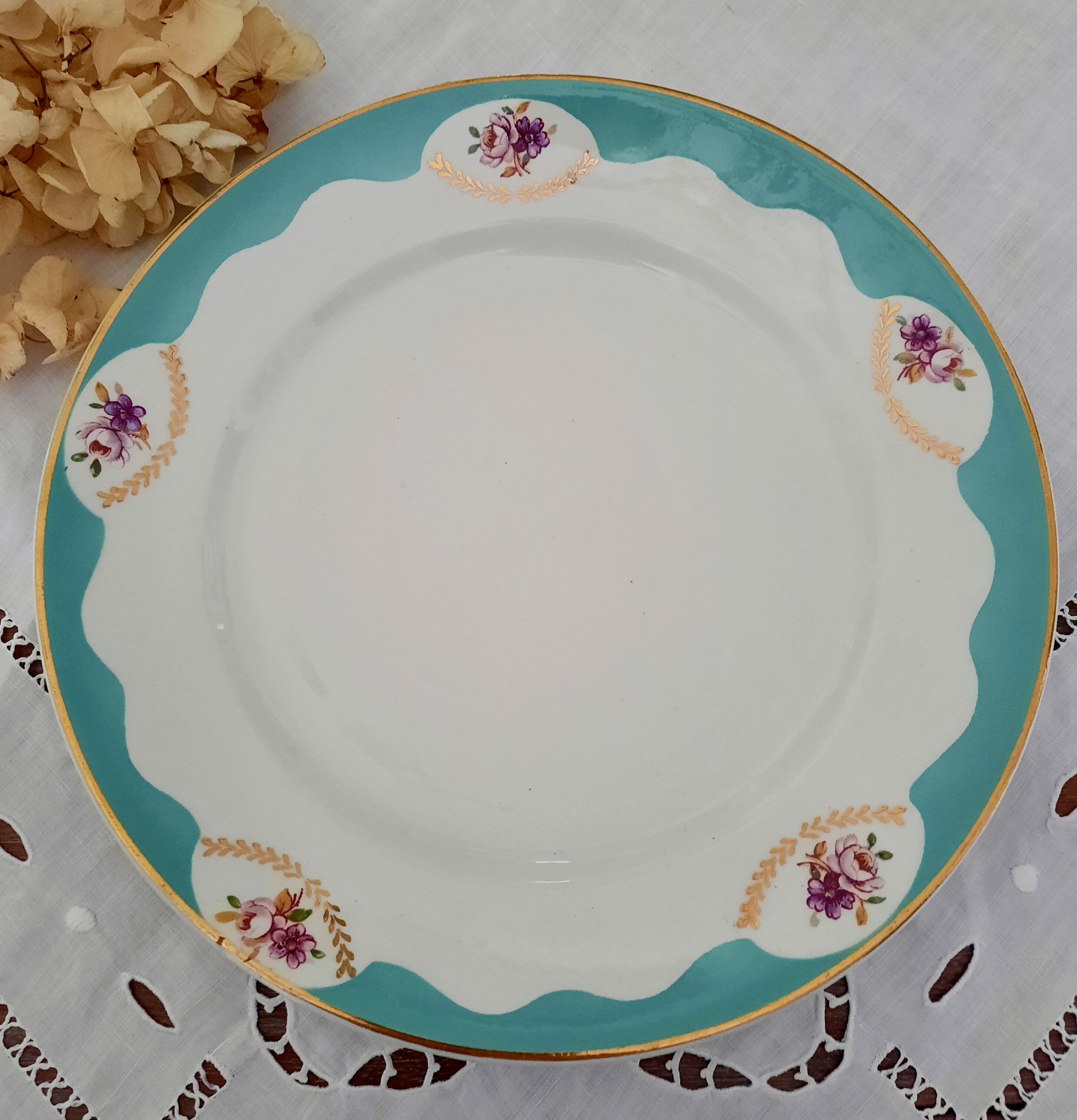 Mismatched old flat plates with gold