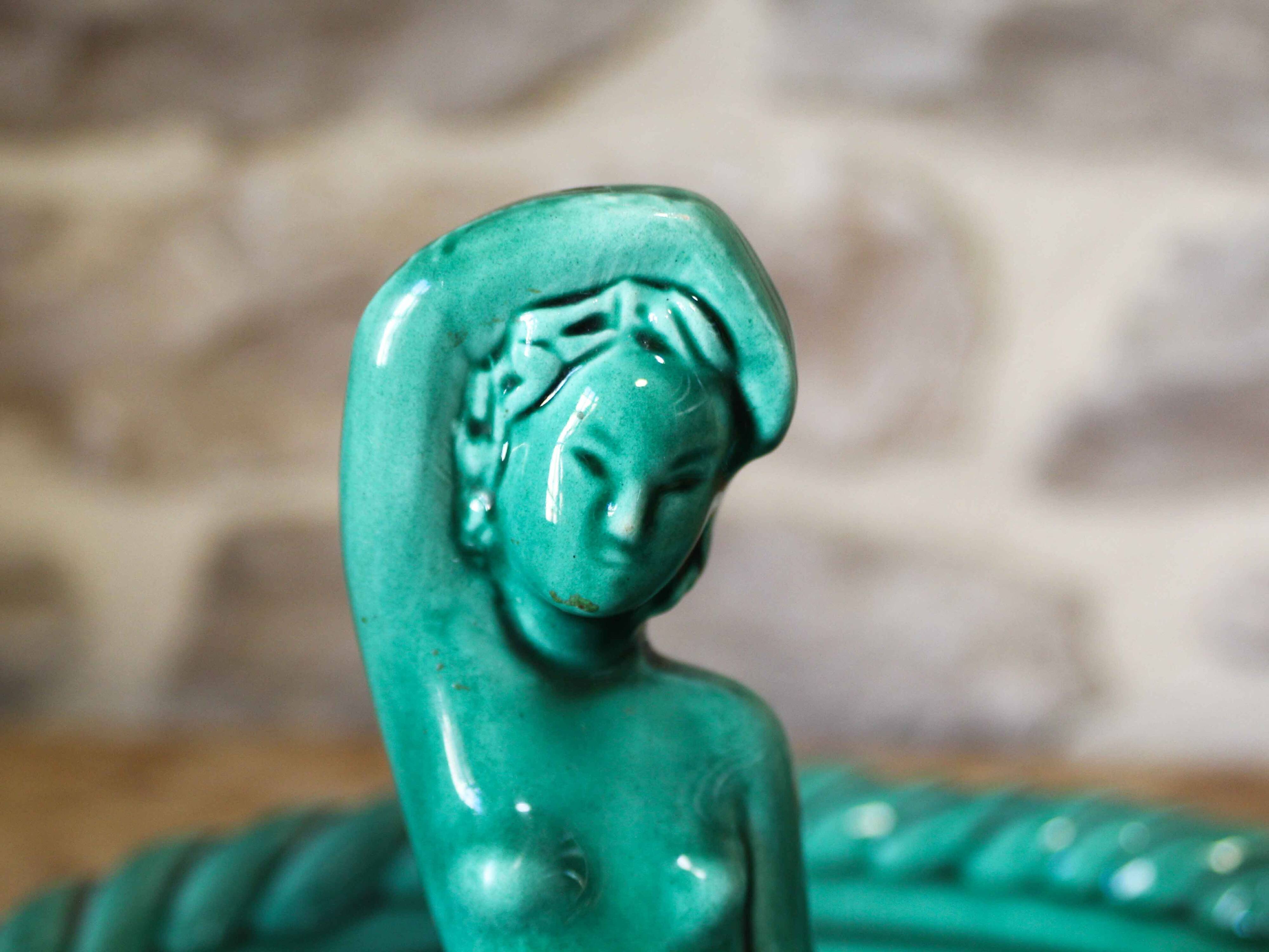 Ceramic cup with mermaid decoration
