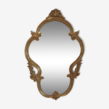 Miroir doré baroque ovale allongé