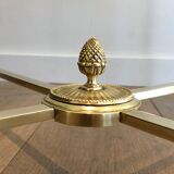 Round brass coffee table. Maison Baguès