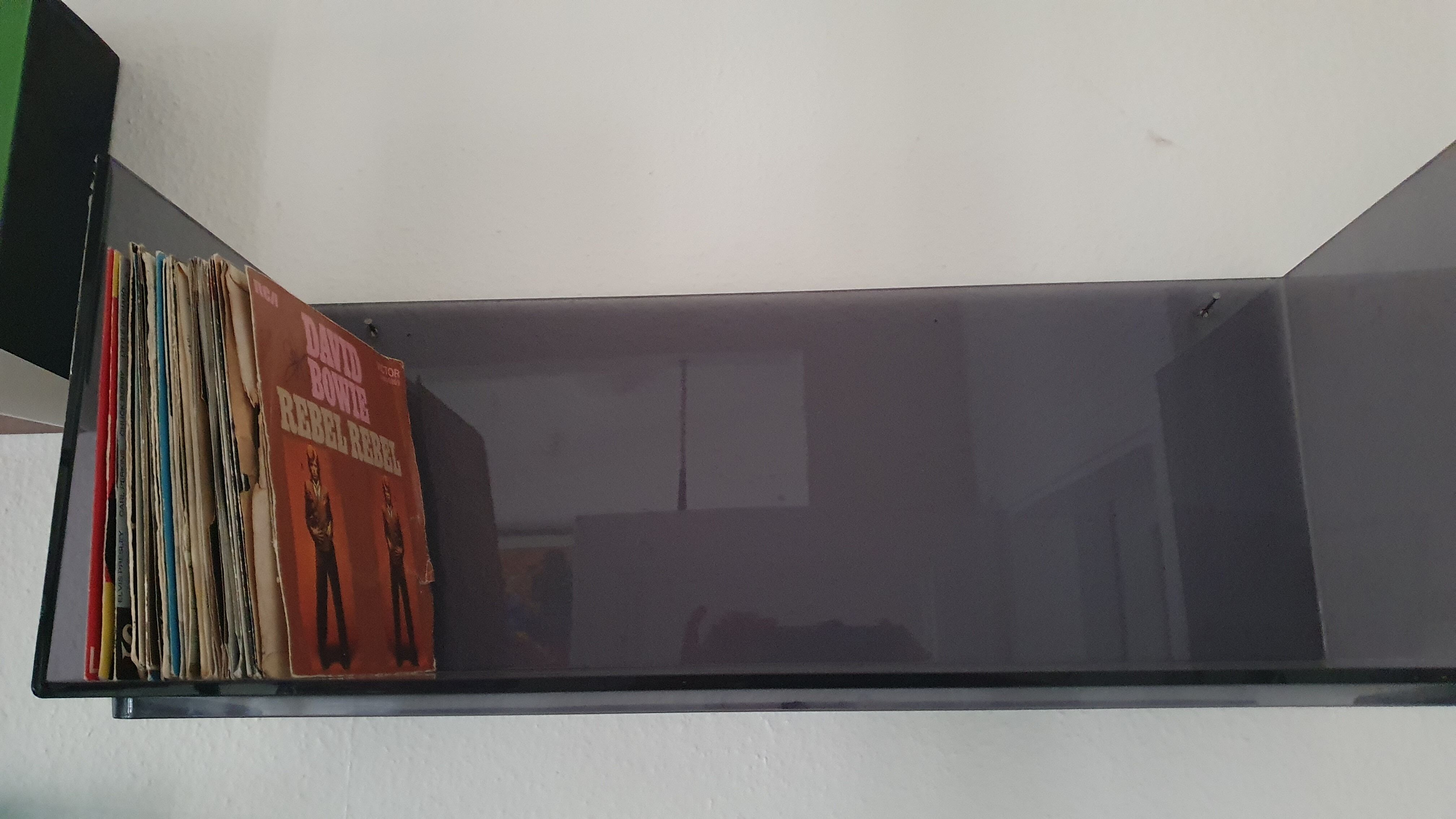 Plexiglas wall shelf