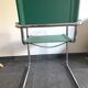 Pair of faux leather and chrome armchairs