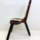 Chaise sculptée en bois et peau — 1950–1970