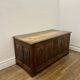Large antique chest in weathered solid wood