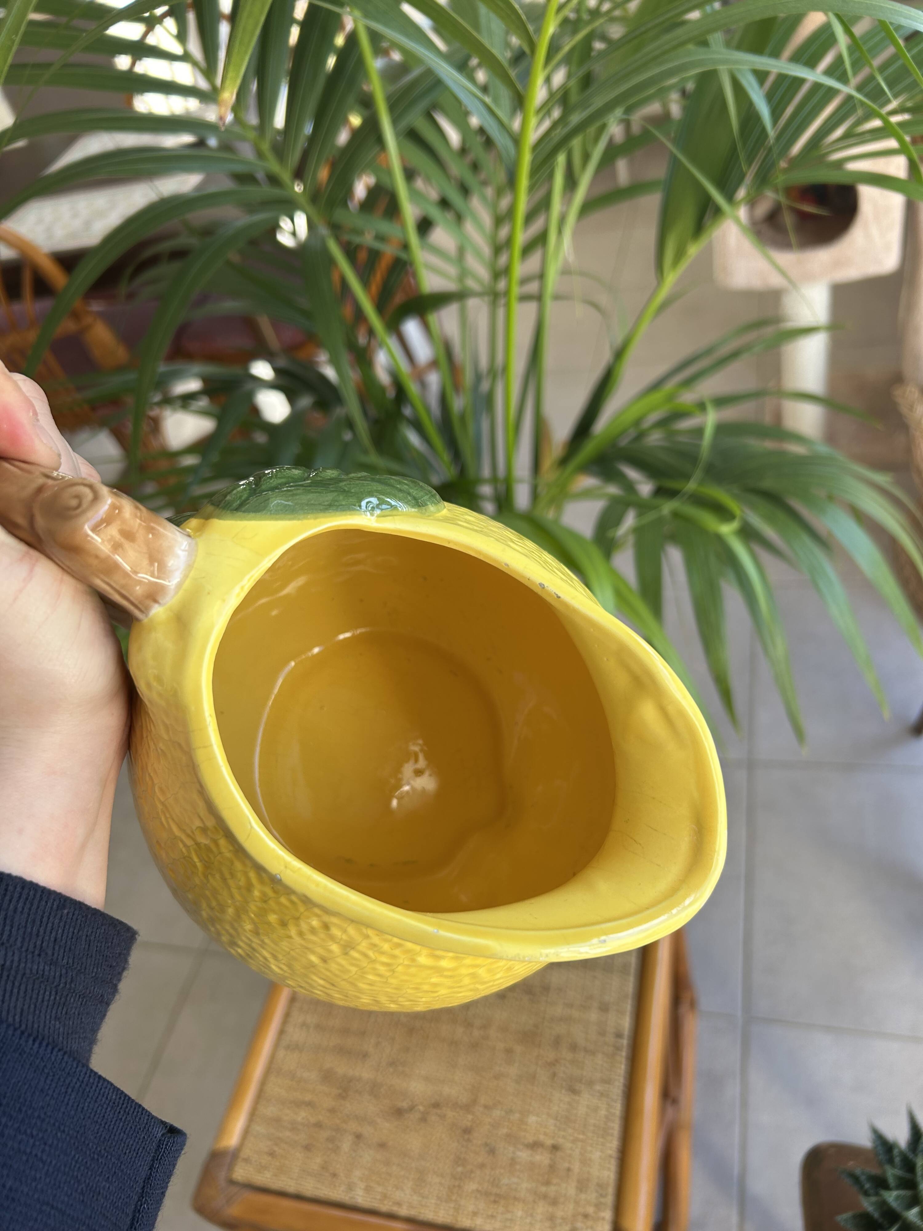 Ceramic jug with a lemon design.