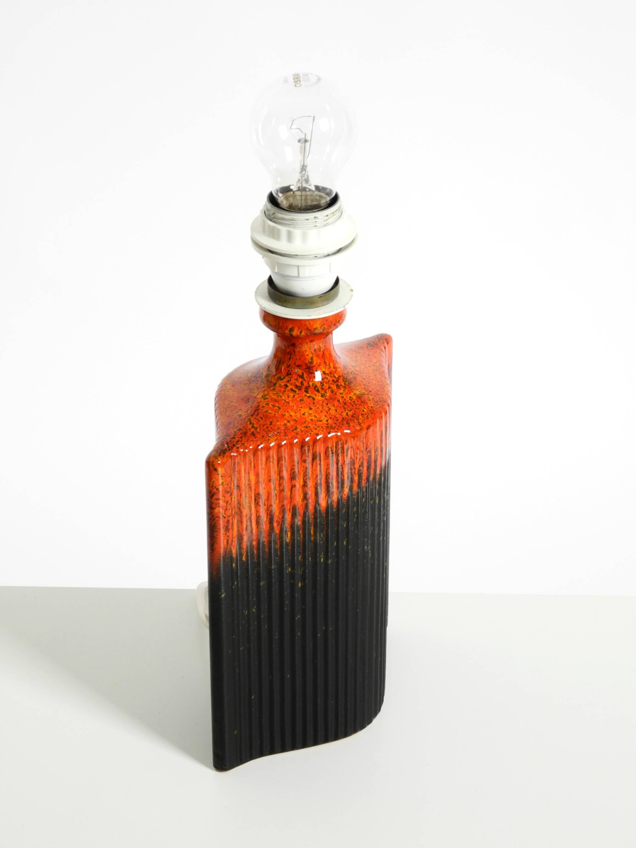 Unique 1960s ceramic table lamp in red and black by Kaiser Leuchten