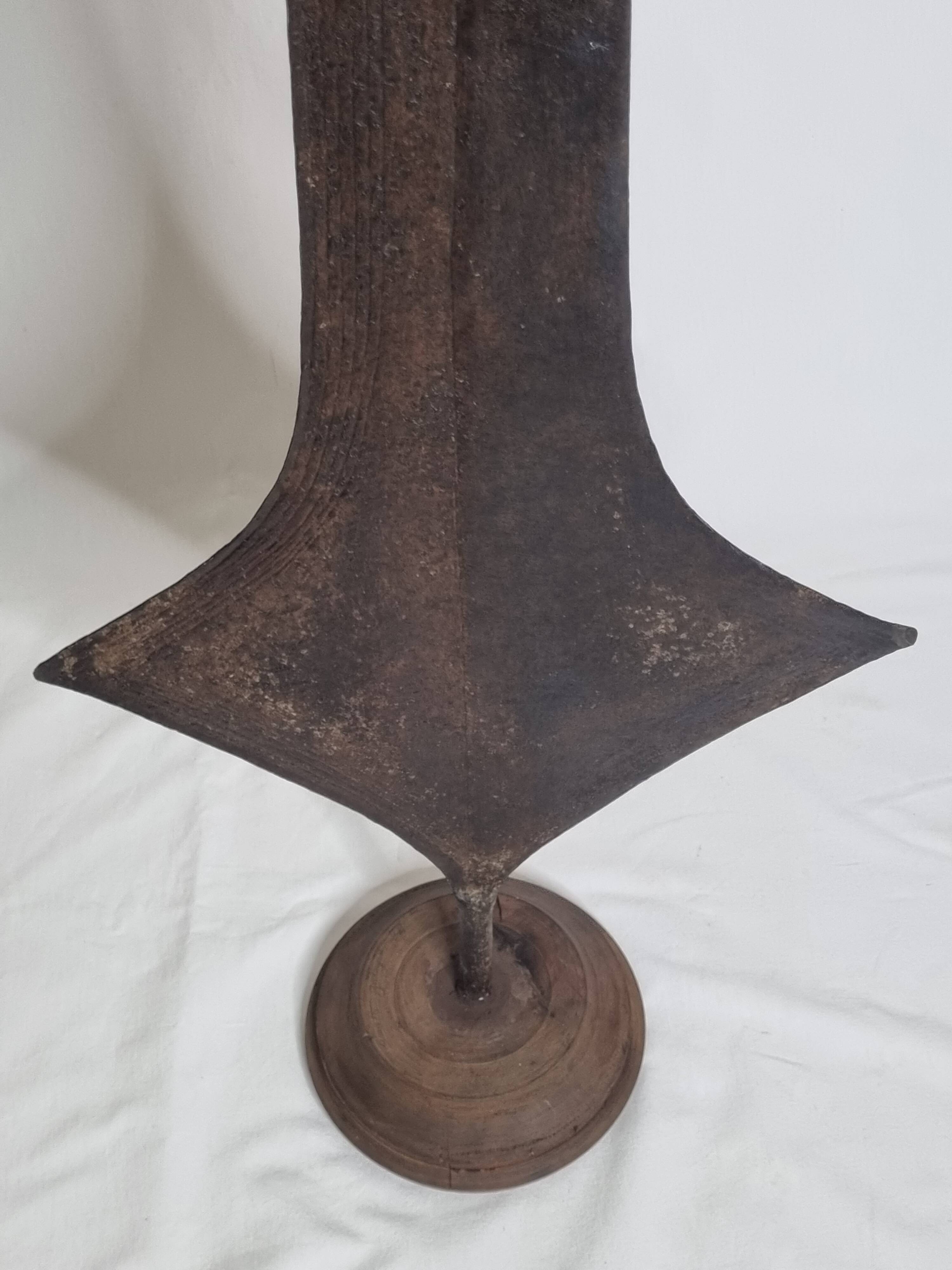 Large Topoké coin, also known as Liganda, wrought iron, sculptural, late 19th century, 160 cm