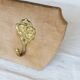 Vintage velvet coat rack with brass hooks