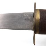 Fish knife and fork with a wooden and brass sheath sculpture.