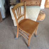 Wooden chair with wheels