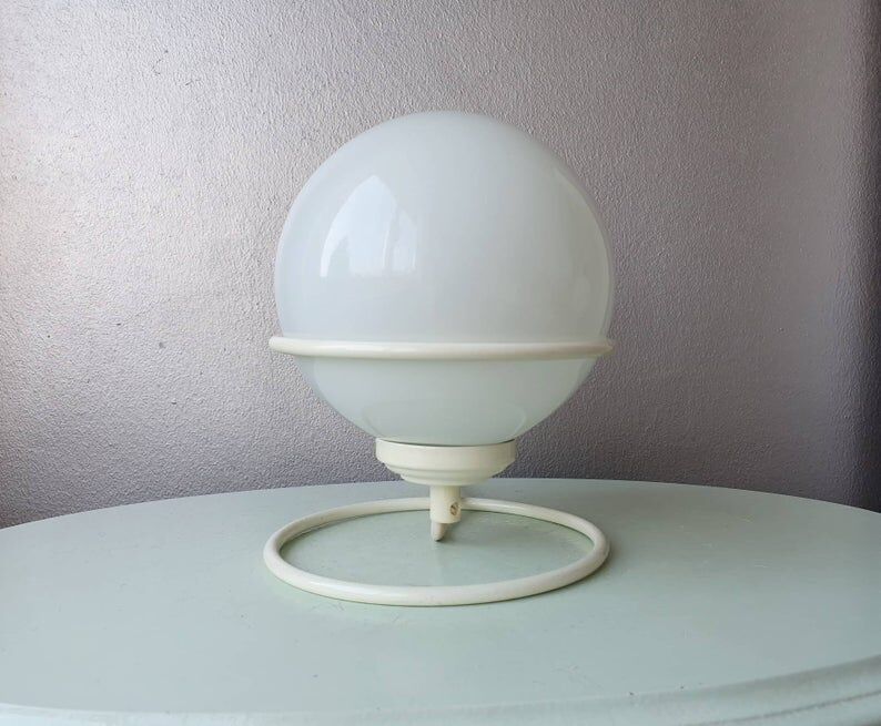 Vintage light bulb lamp on metal support 1980